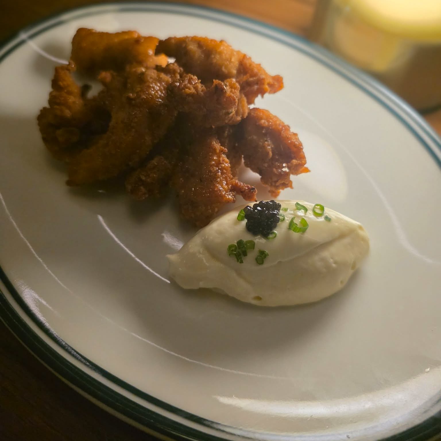 Chicken tenders, buttermilk ranch, hot honey with caviar.