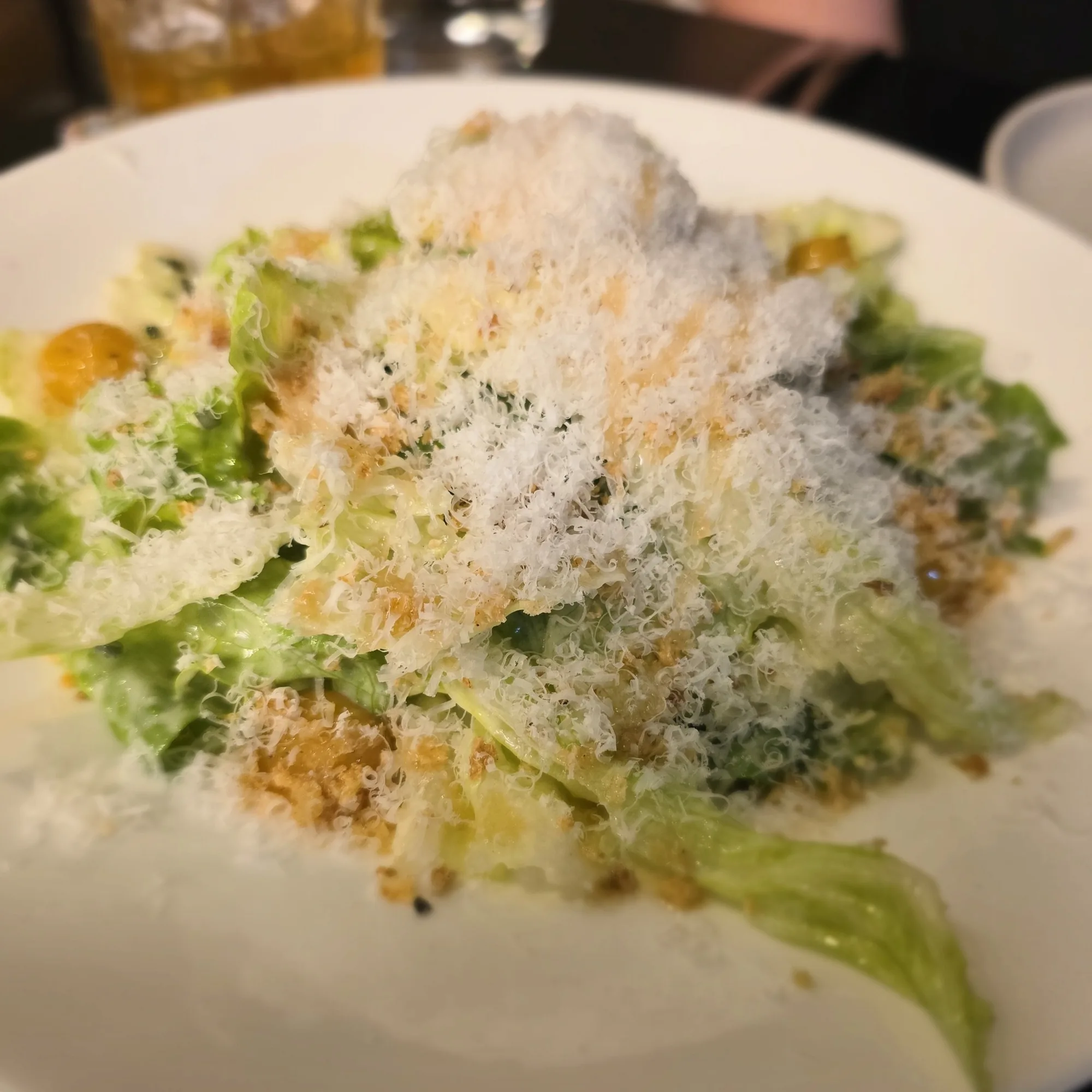 Attimi&rsquo;s Caesar salad, caesar style, yolk, Pecorino Romano, Caesar dressing.