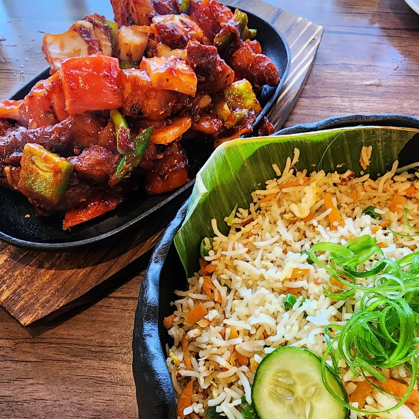 Chicken devilled; Sizzling chicken pieces mixed with capsicums and onions and Sri Lankan fried rice