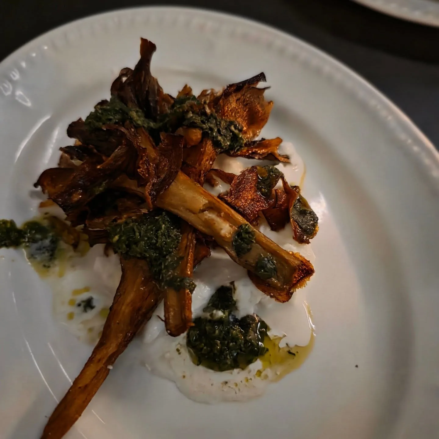 Fried artichokes with whipped ricotta and salsa verde