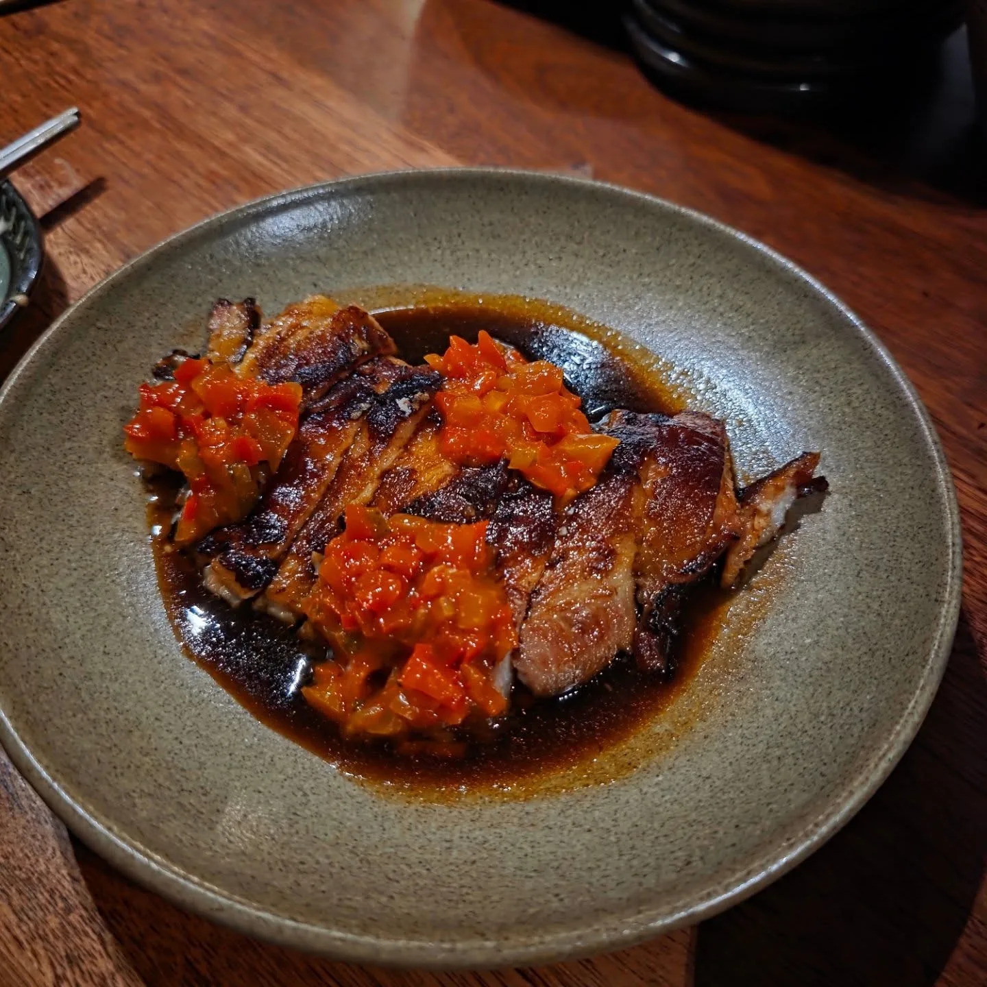 Pork jowl, red pepper relish, cherry blossom