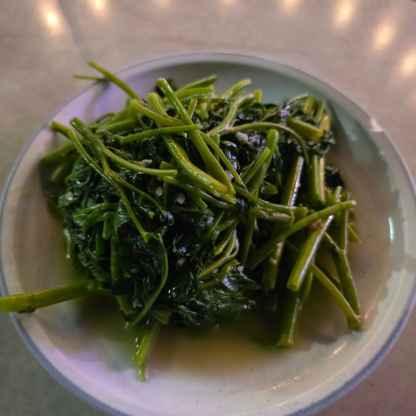 Wok fried water spinach