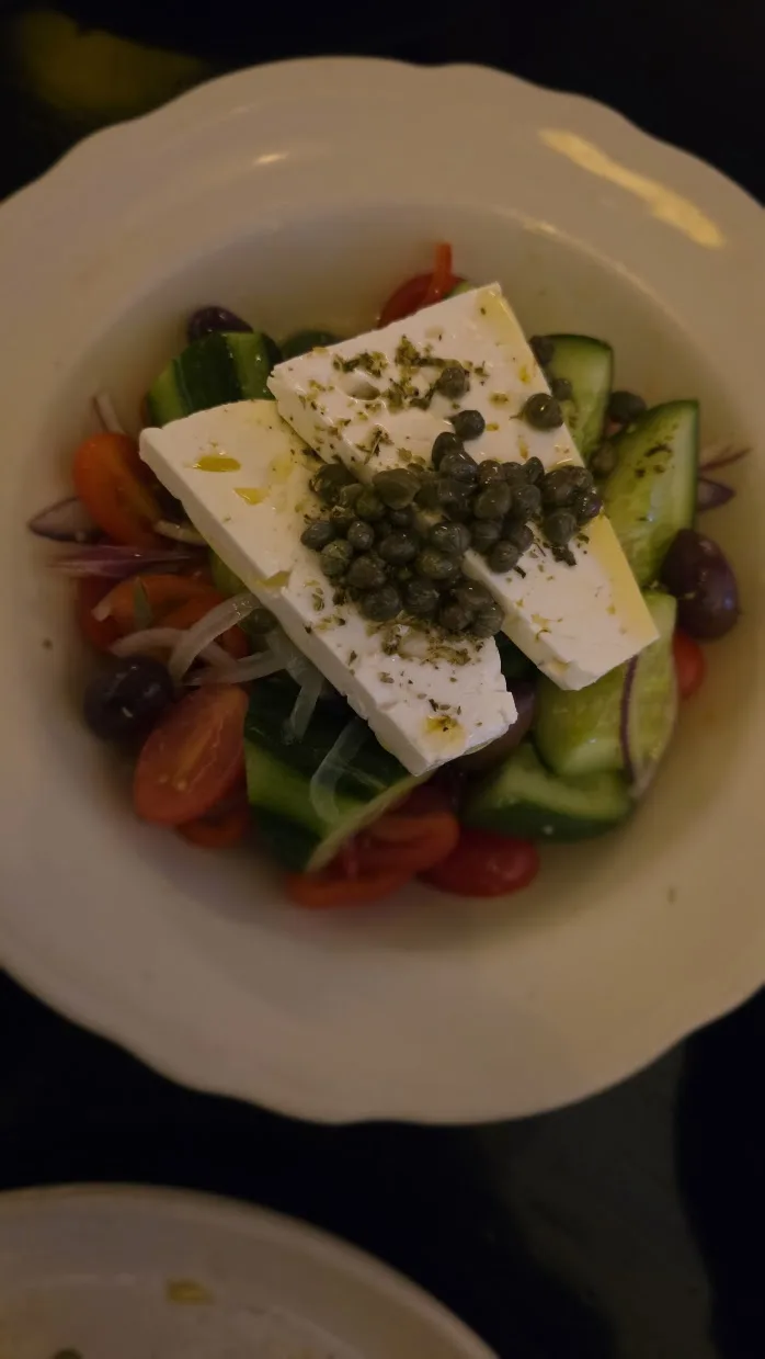 Village salad: tomato, cucumber, olives, feta