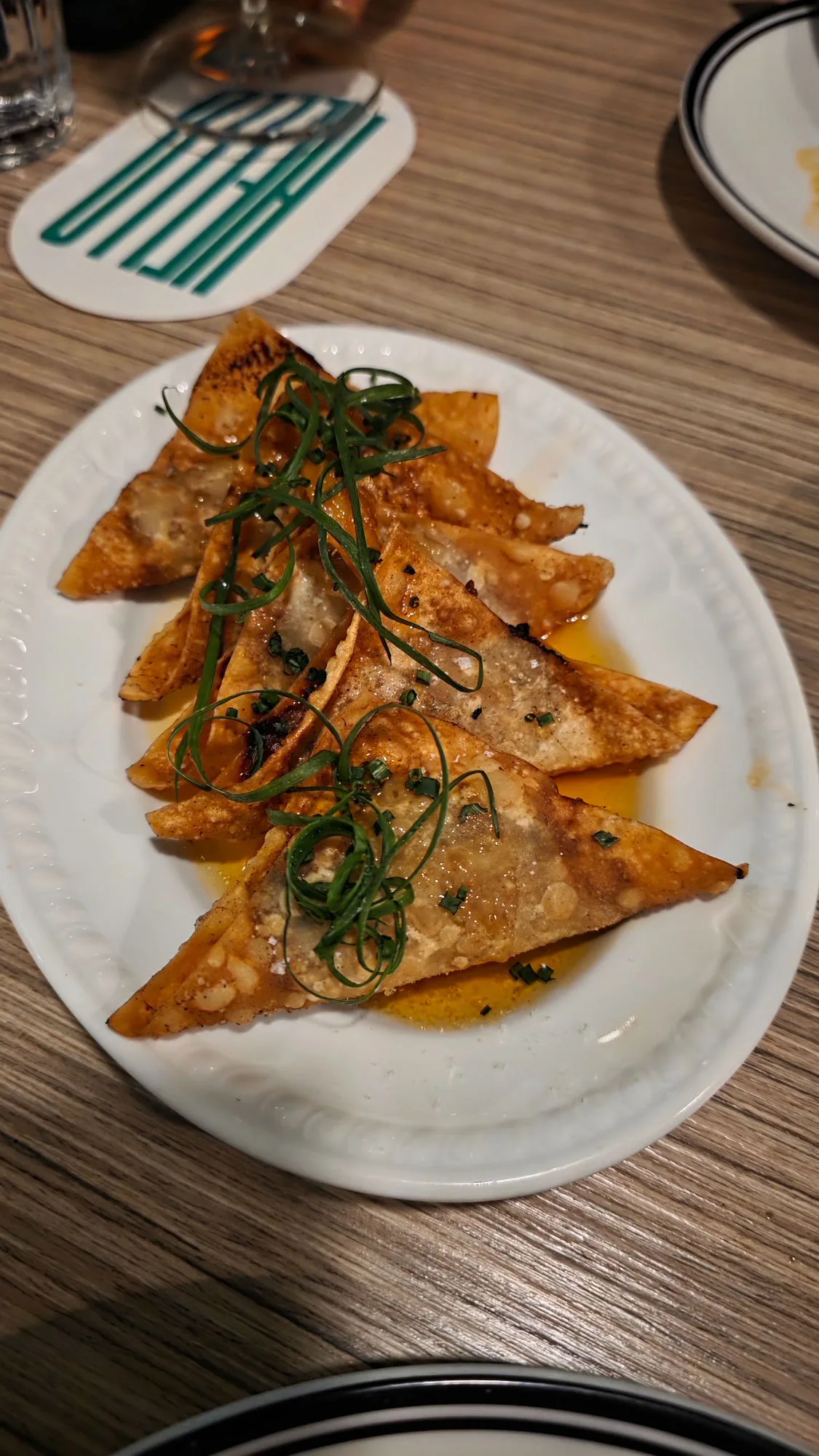 Crispy duck wontons, ginger and orange caramel
