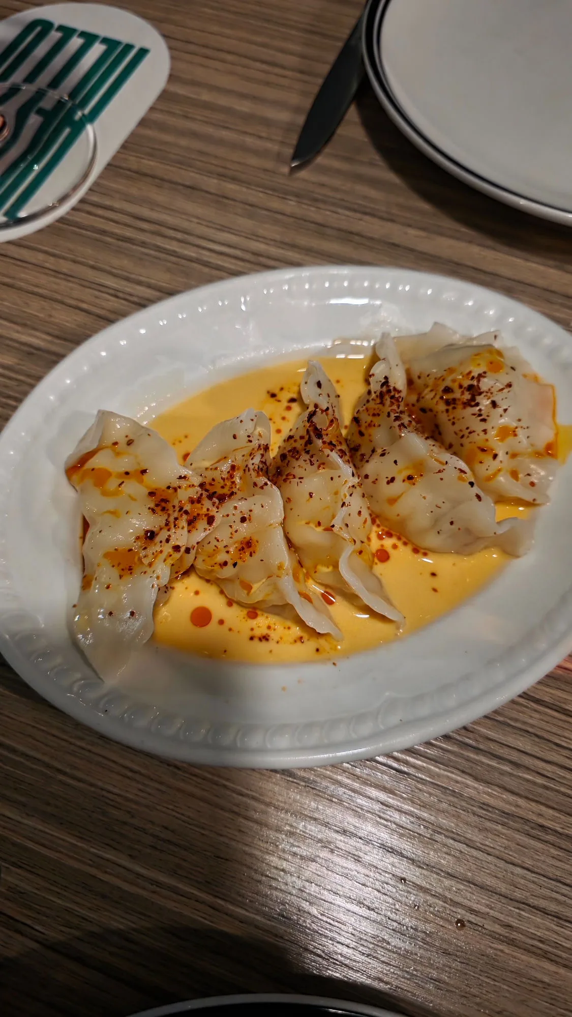 Bay lobster dumplings, fermented chilli butter