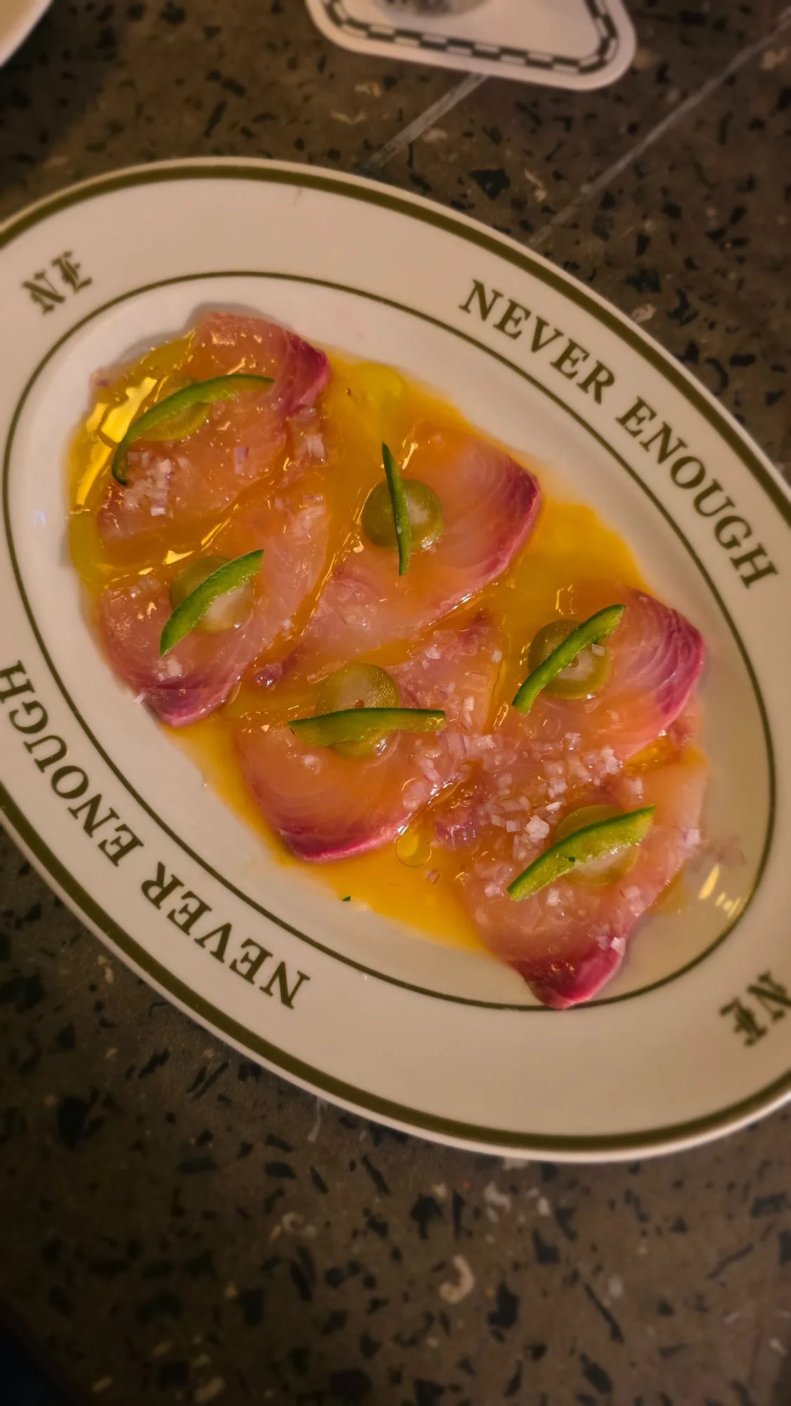 Hiramasa kingfish, passionfruit vinaigrette, pickled peach