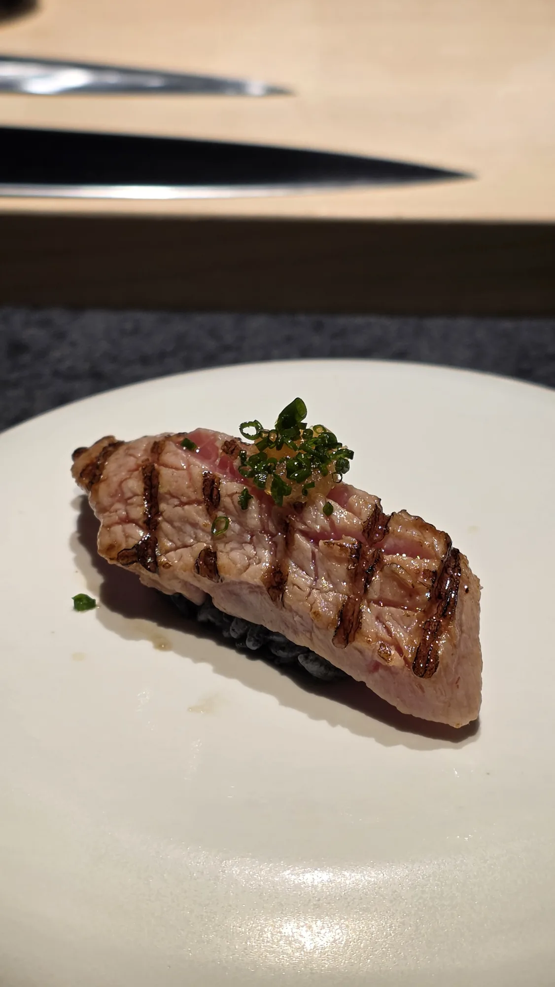 Tasmanian southern bluefin chutoro, seared, on charcoal rice