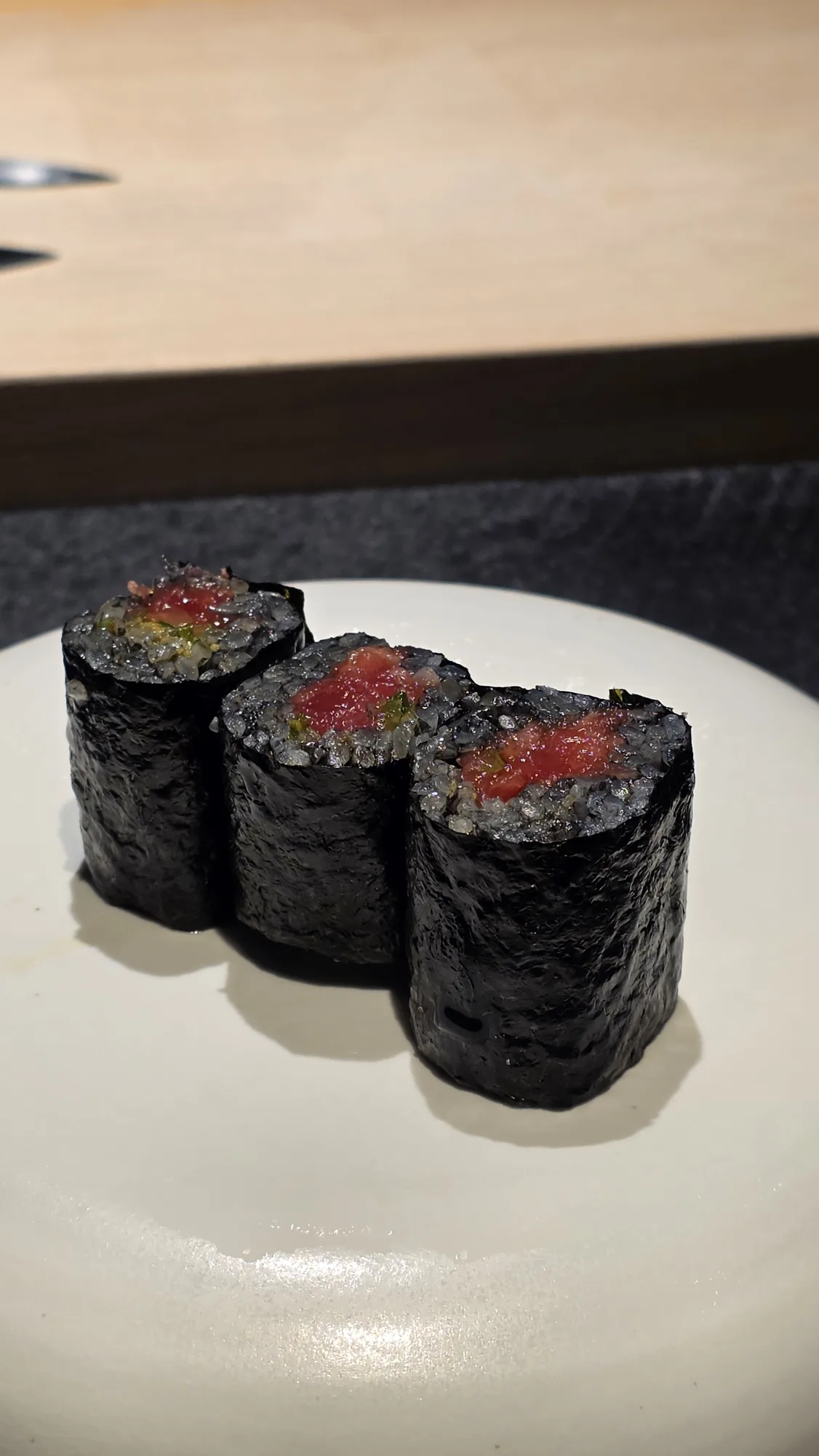 Maguro maki on charcoal rice